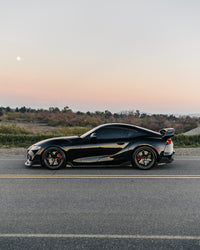 A90 Supra AG Style Carbon Fiber Skirt Extensions